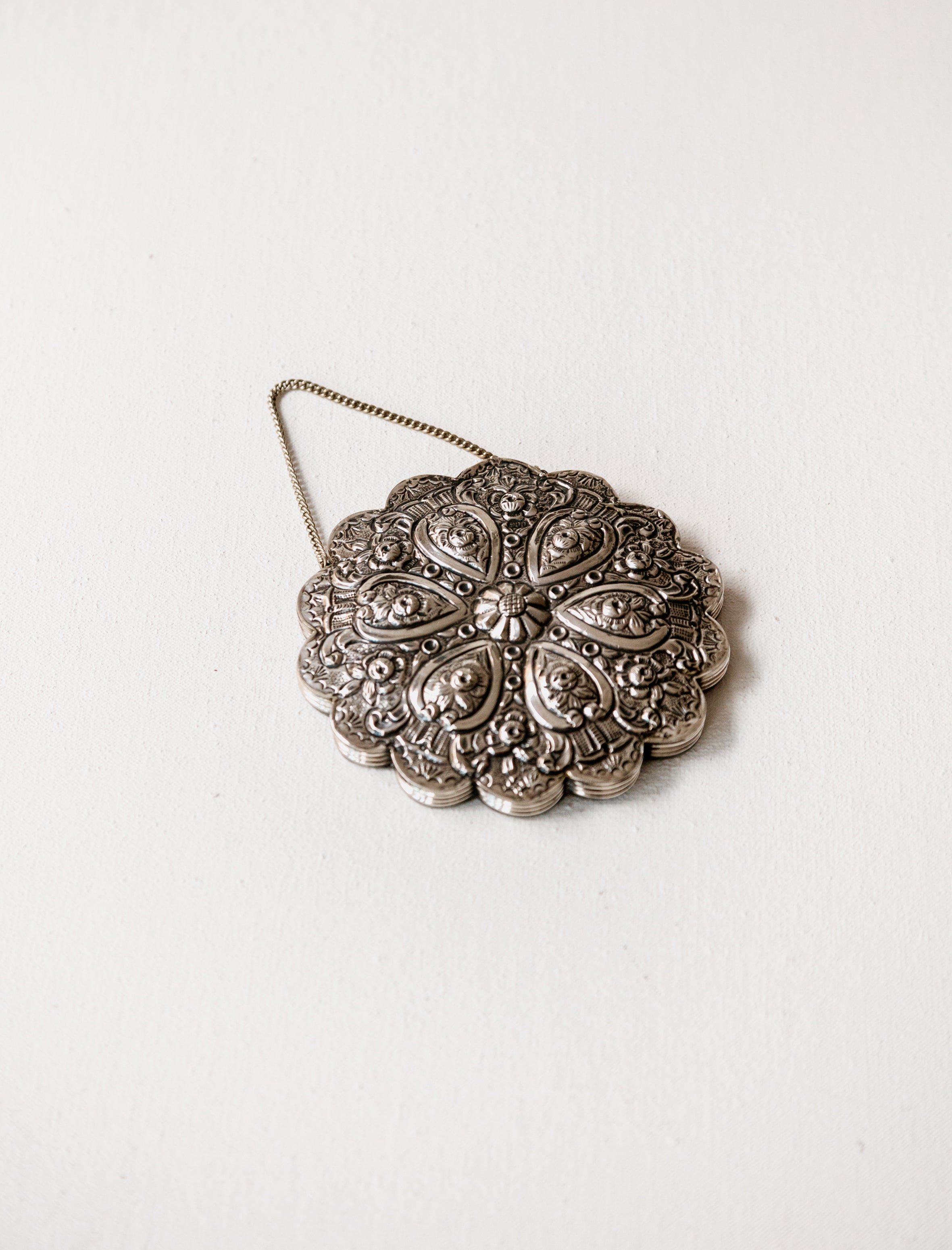 Found by Neighbour Repoussé Hanging Silver Mirror