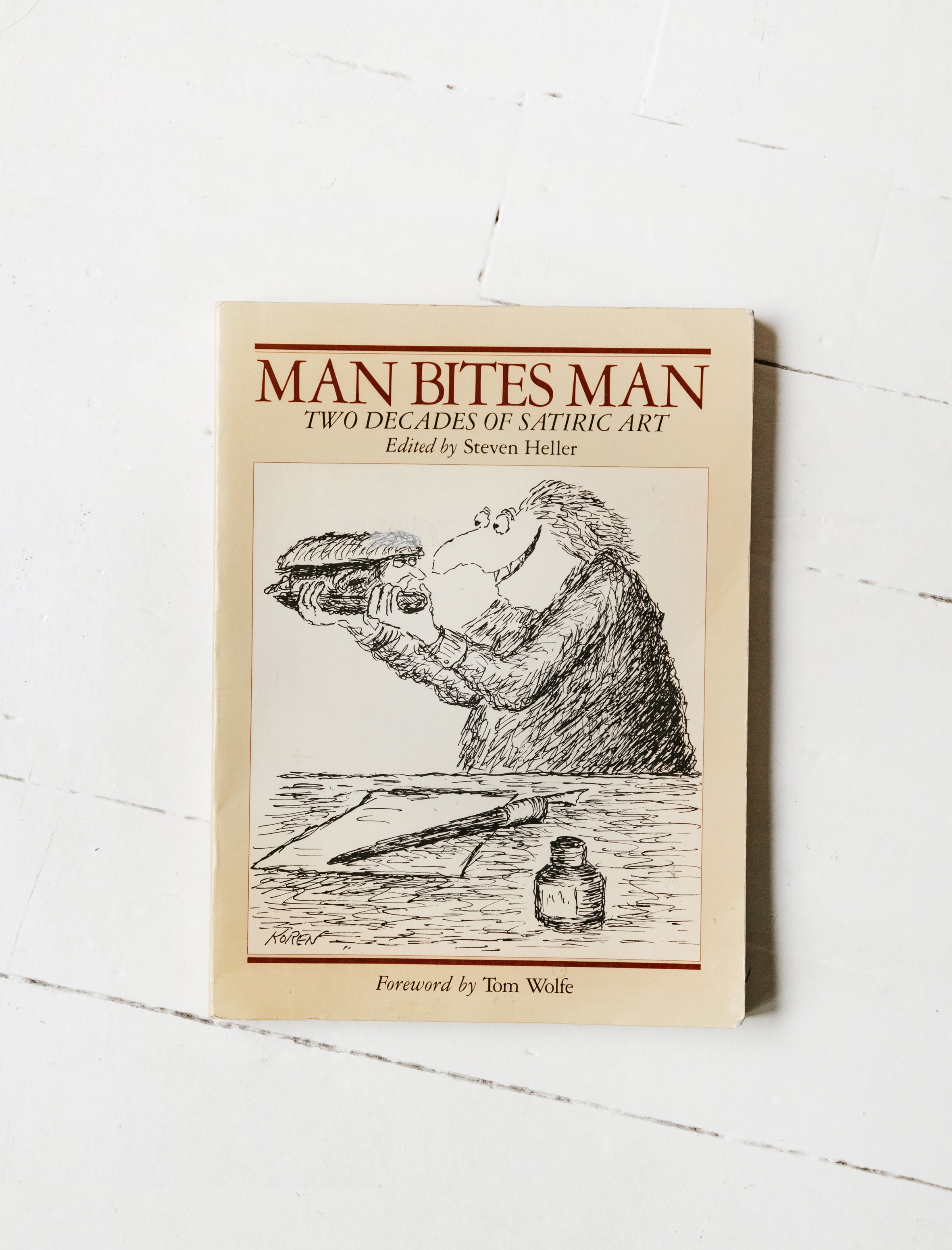 Man Bites Man : Two Decades of Drawings and Cartoons