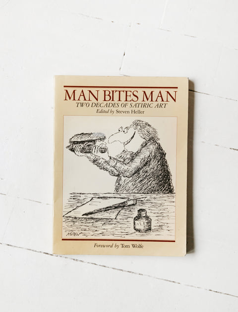 Man Bites Man : Two Decades of Drawings and Cartoons